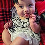 Freya joined the competition — help win amazing prizes! baby, child, infant, smiling, tongue_out, black_bow, headband, dress, floral_pattern, red_blanket, plaid, sitting, cute, happy, chubby_arms, chubby_legs, indoors, portrait, black_and_white, playful
