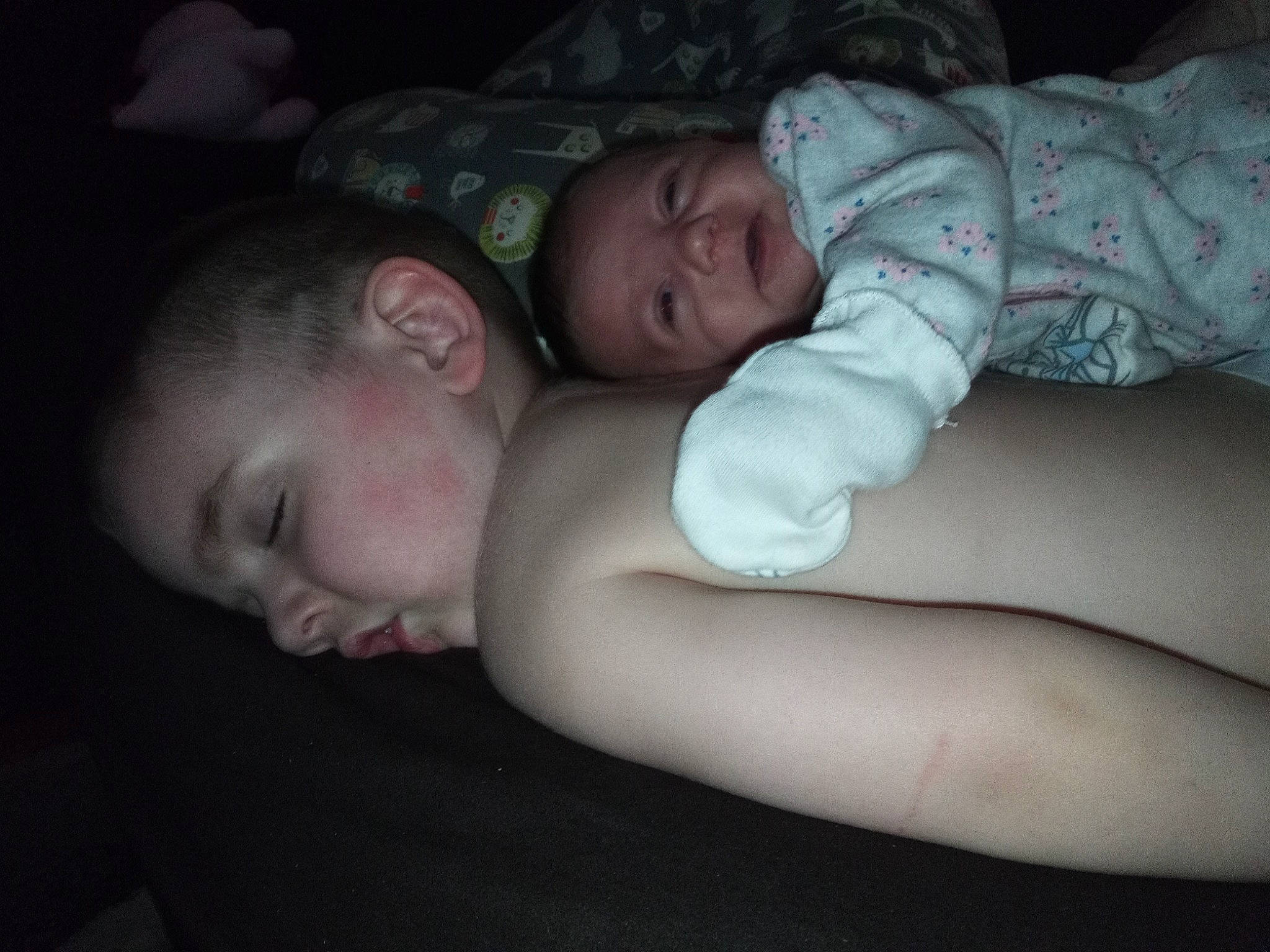 Alexis Rose is registered to the contest to win money with this photo: abdomen, baby, bedtime, cheek, chest, child, comfort, darkness, elbow, flash_photography, flesh, fun, mouth, nose, person, room, sitting, skin, sleep, toddler