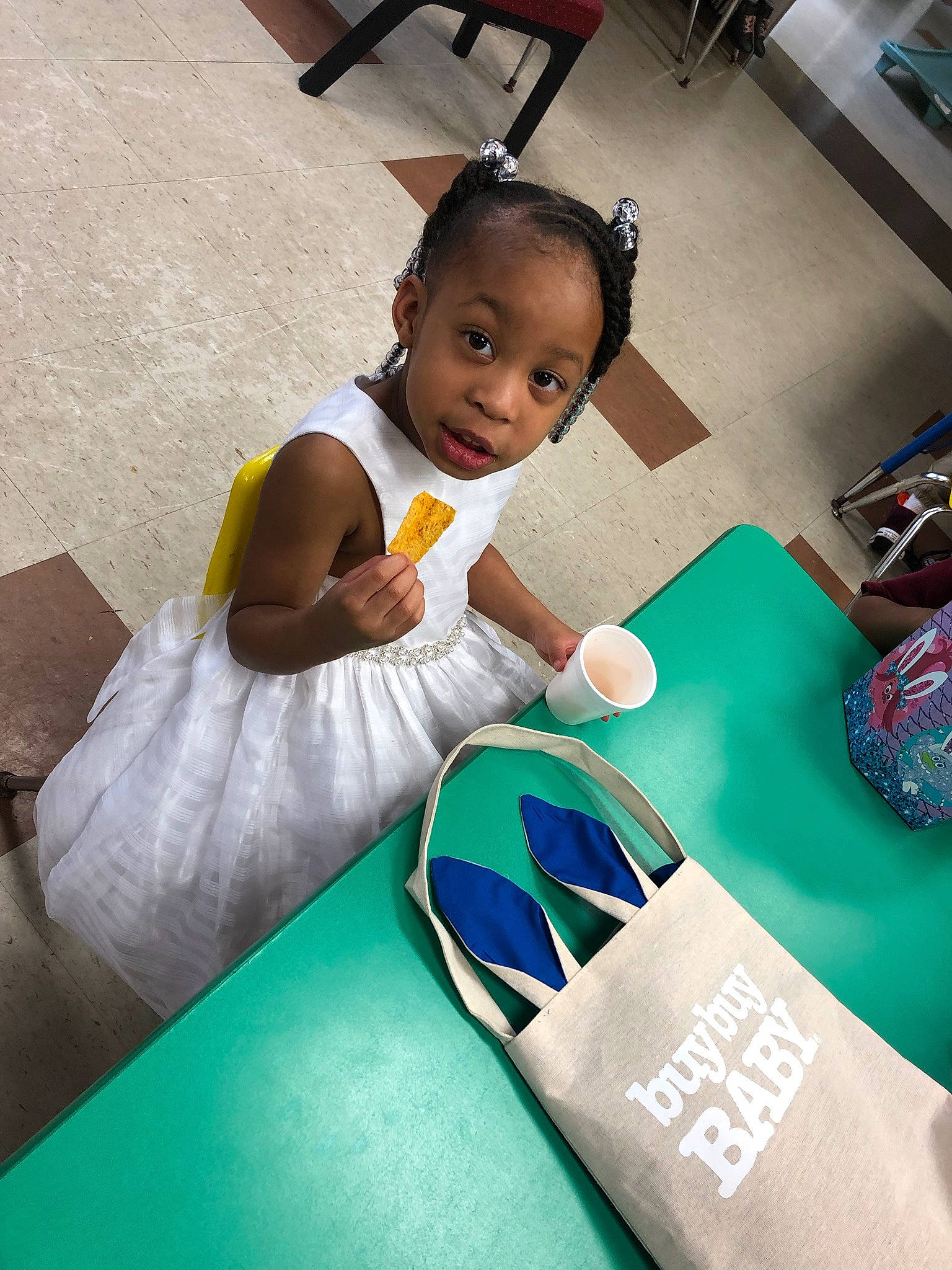 Emani is registered to the contest to win money with this photo: baby, child, person, play, skin, smile, technology, toddler, vacation