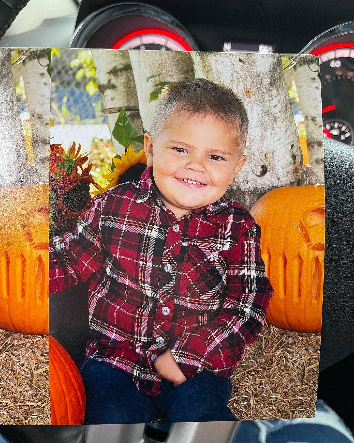 Leland joined the competition — help win amazing prizes! automotive_tire, beauty, child, christmas, design, electronic_device, facial_expression, fun, happy, holiday, joy, orange, pattern, person, plaid, product, sitting, smile, tartan, textile