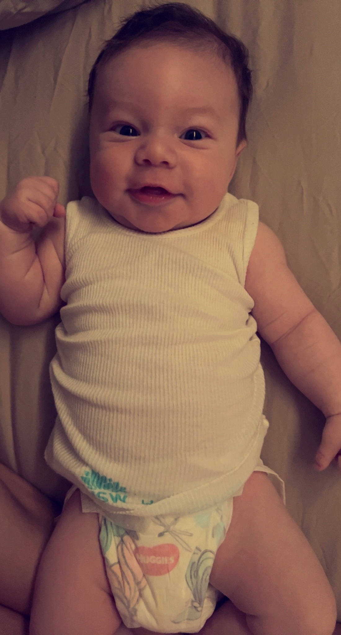 Jakobi is registered to the contest to win money with this photo: baby, baby_toddler_clothing, cheek, chin, eye, eyebrow, face, facial_expression, head, human_body, iris, lip, mouth, nose, organ, person, skin, sleeve, smile, standing