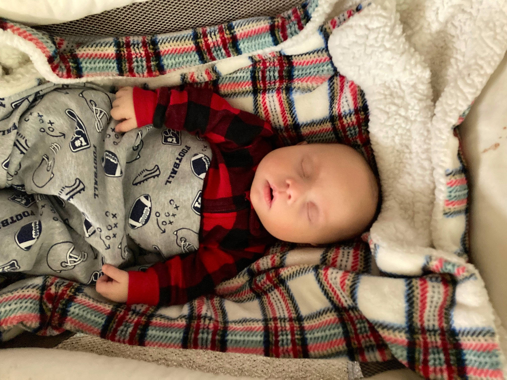 Tucker joined the competition — help win amazing prizes! baby, baby_toddler_clothing, collar, comfort, design, face, head, human_body, linens, pattern, person, plaid, red, skin, sleeve, tartan, textile, thigh, toddler, toy