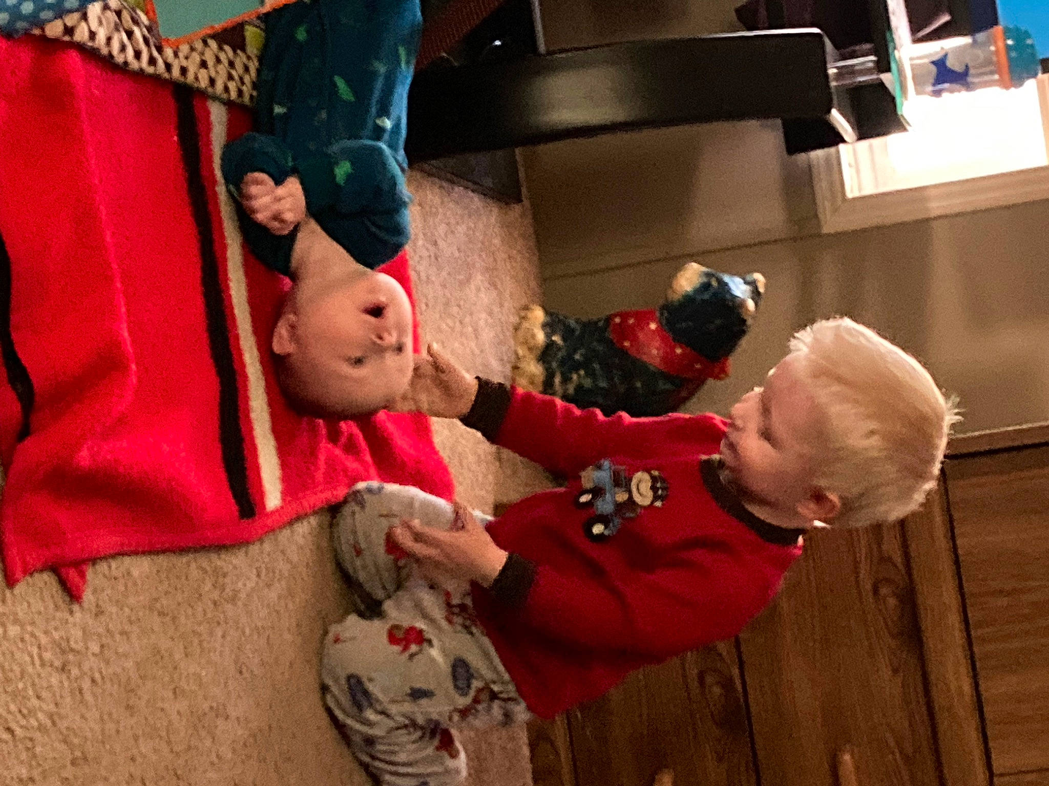 Tucker joined the competition — help win amazing prizes! baby, carmine, child, christmas, comfort, event, fictional_character, foot, fun, gesture, hand, happy, holiday, lap, leisure, person, room, smile, toddler, tree