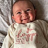 Amyrah is registered to the contest to win money with this photo: baby, babylaughing, blanket, face, happy, head, person, smile