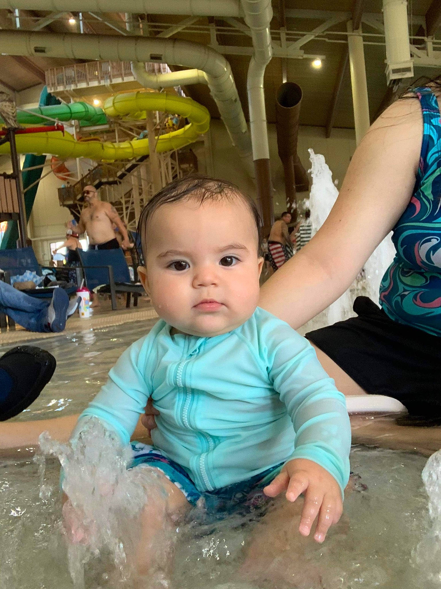 Shane joined the competition — help win amazing prizes! baby, baby_toddler_clothing, bathing, blue, chair, child, flooring, fountain, fun, green, happy, leisure, person, photograph, recreation, sitting, snapshot, t_shirt, toddler, vacation