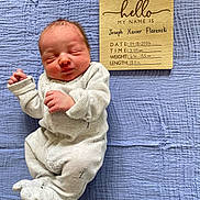 Joseph is registered to the contest to win money with this photo: newborn, baby, infant, sleeping, blue_blanket, wooden_sign, name_sign, cozy_clothing, cute, peaceful, portrait, lying_down, infant_clothing, baby_boy, soft_texture, resting, baby_sleep, newborn_photo, baby_name, birth_details
