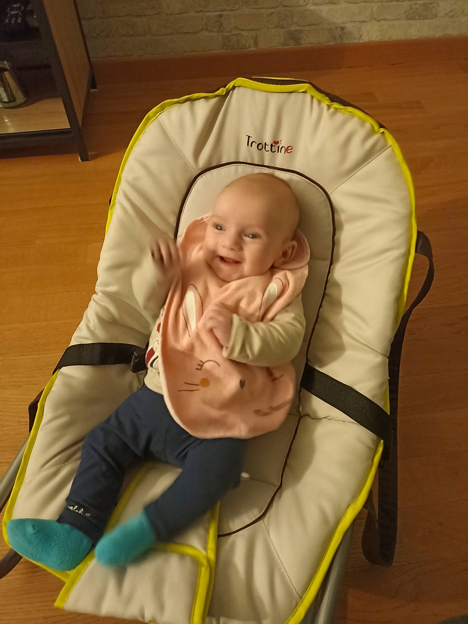 Ileana participe au concours pour gagner de l'argent avec cette photo : art, baby, baby_carriage, baby_products, blessing, cheek, chest, child, comfort, fictional_character, gesture, human_body, joy, person, personal_protective_equipment, room, sitting, thumb, toddler