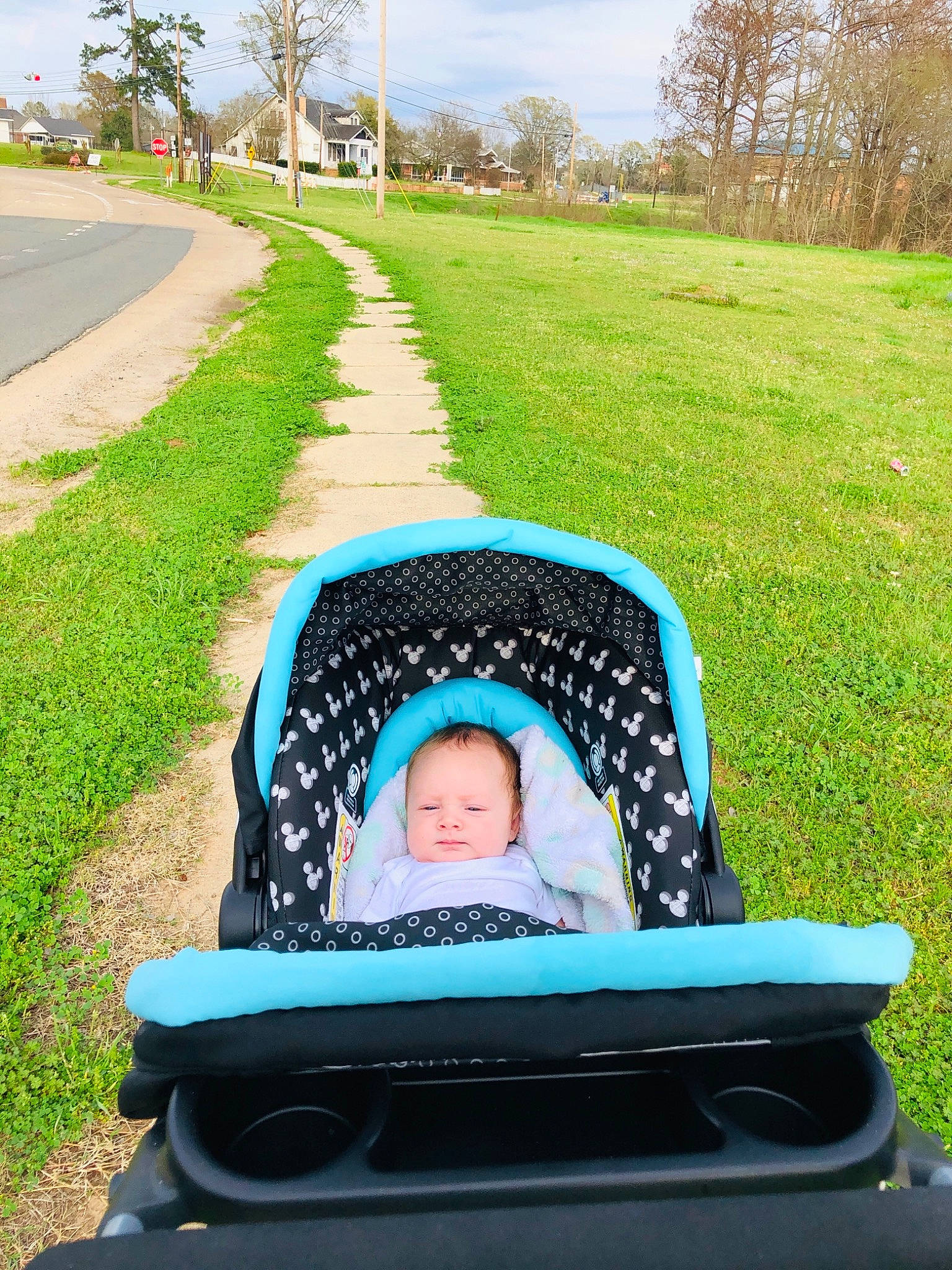 Greysen is registered to the contest to win money with this photo: baby_carriage, baby_products, design, furniture, grass, green, leisure, person, plant, product, vehicle