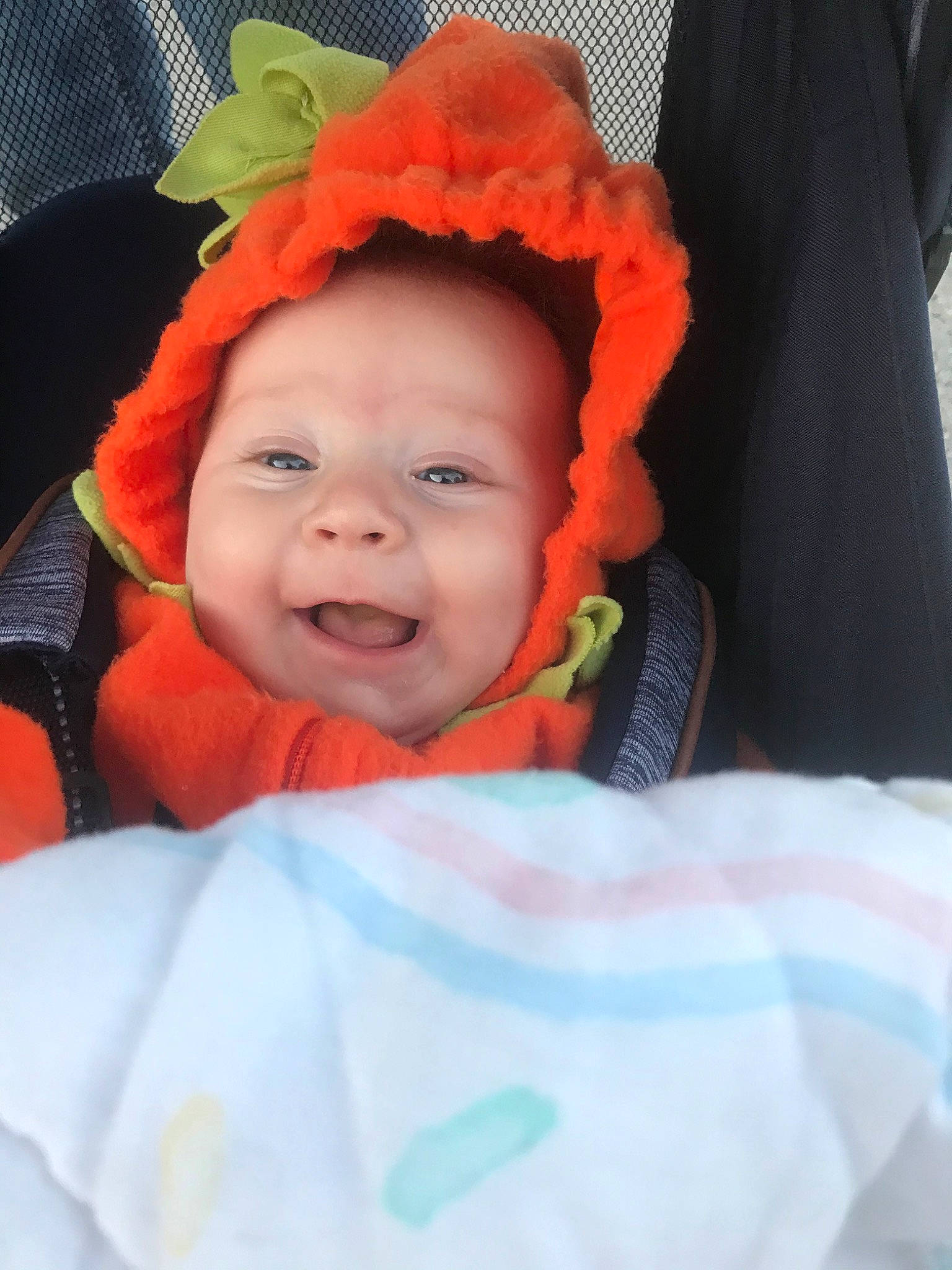 Lakelyn joined the competition — help win amazing prizes! baby, baby_products, baby_toddler_clothing, child, chin, comfort, costume_hat, event, eye, eyebrow, fun, happy, human_body, iris, mouth, orange, person, personal_protective_equipment, sleeve, smile