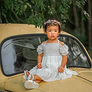 Iylah joined the competition — help win amazing prizes! bodypart, car, child, clothing, dress, eveningdress, face, fashion, female, finger, formalwear, girl, hand, head, person, photography, portrait, sitting, transportation, vehicle