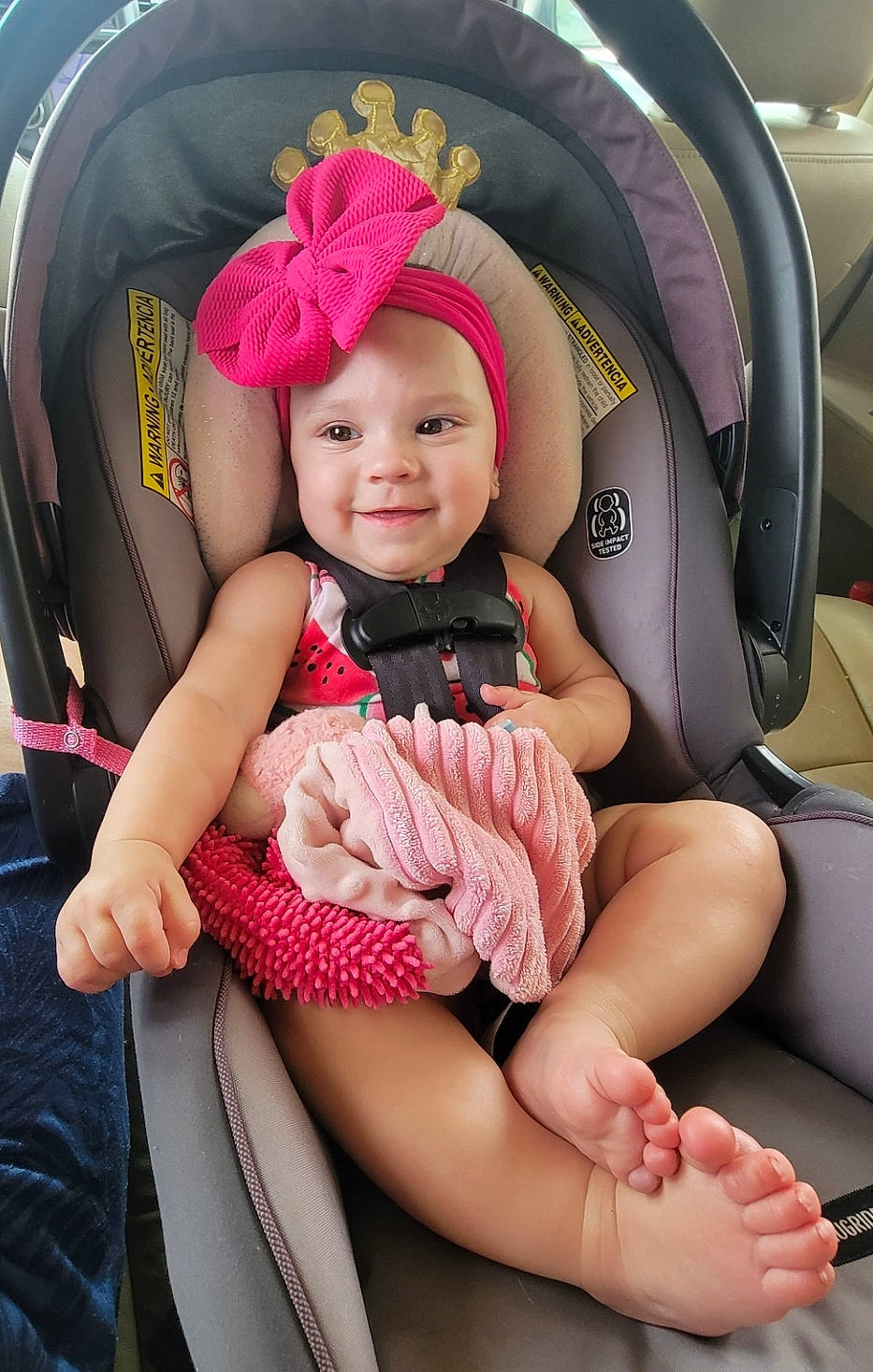 Elena joined the competition — help win amazing prizes! auto_part, automotive_design, baby, baby_carriage, baby_in_car_seat, baby_toddler_clothing, car_seat, child, comfort, facial_expression, finger, happy, headwear, joy, person, pink, product, skin, smile, thigh