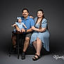 Eliza joined the competition — help win amazing prizes! baby, child, man, woman, family, portrait, smiling, blue_dress, bow, stool, shorts, sitting, studio, happy, casual, footwear, arm, holding, people, indoor