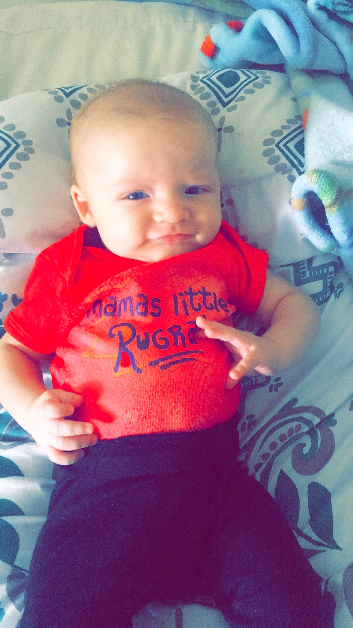 Bryson joined the competition — help win amazing prizes! arm, azure, baby_toddler_clothing, blue, clothing, facial_expression, hairstyle, hand, happy, human_body, mouth, muscle, orange, person, pink, product, skin, sleeve, smile, stomach