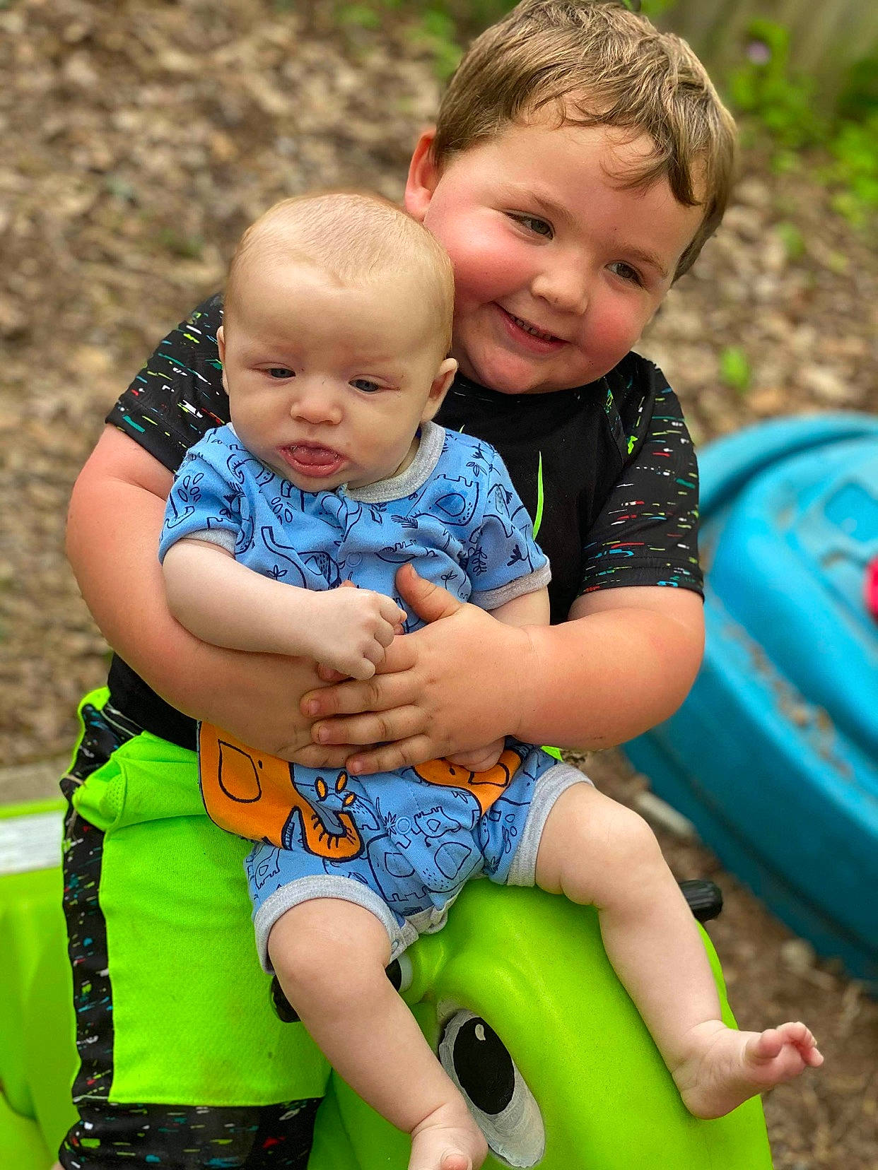 Bryson joined the competition — help win amazing prizes! azure, baby_toddler_clothing, blue, child, facial_expression, fun, grass, green, happy, joy, leisure, people_in_nature, person, photograph, red, shorts, skin, smile, summer, toddler