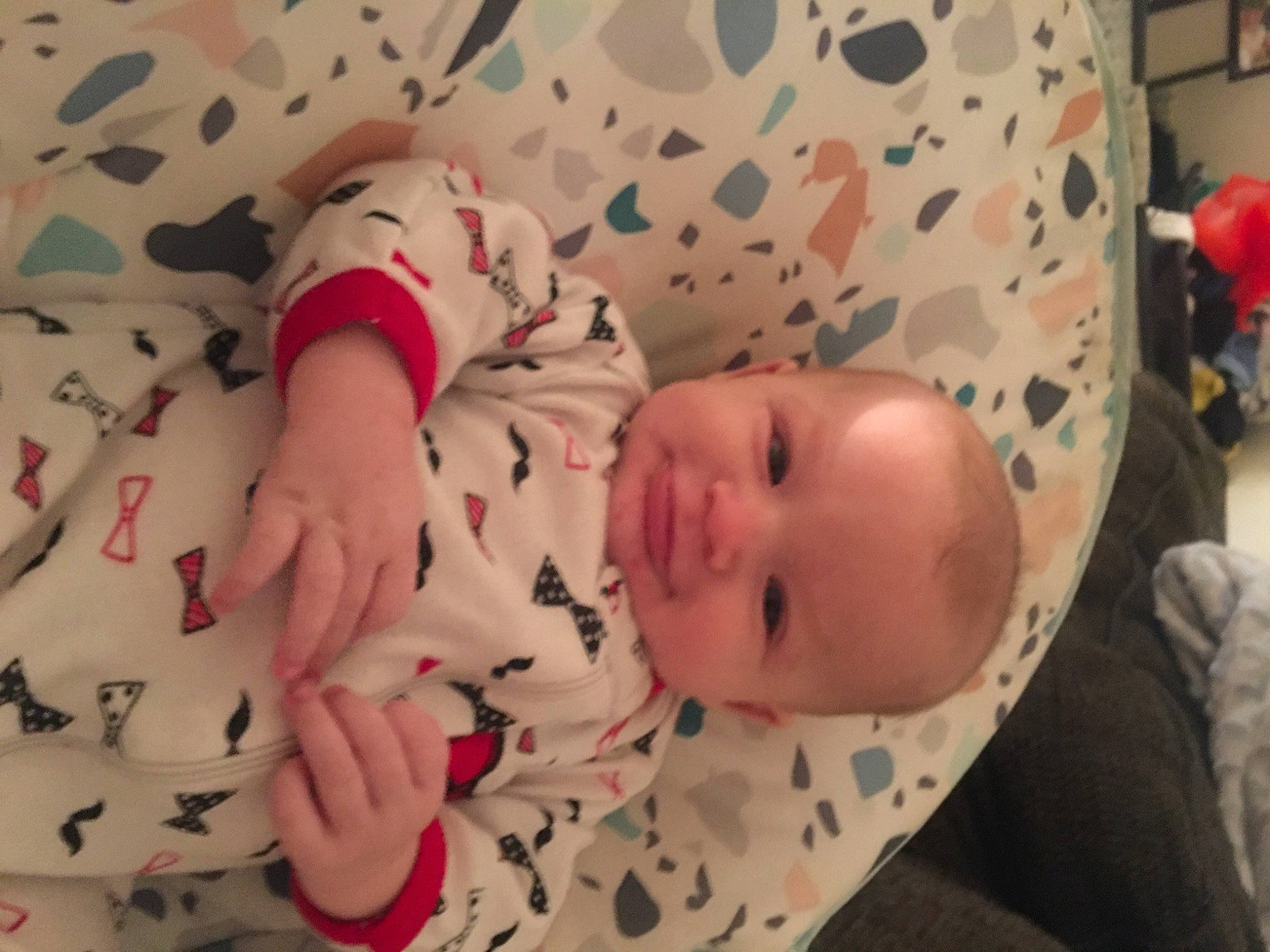 Bryson is registered to the contest to win money with this photo: baby, baby_products, baby_safety, baby_sleeping, baby_toddler_clothing, bedtime, cheek, child, comfort, linens, lip, mouth, nose, pattern, person, pink, skin, sleeve, textile, thumb