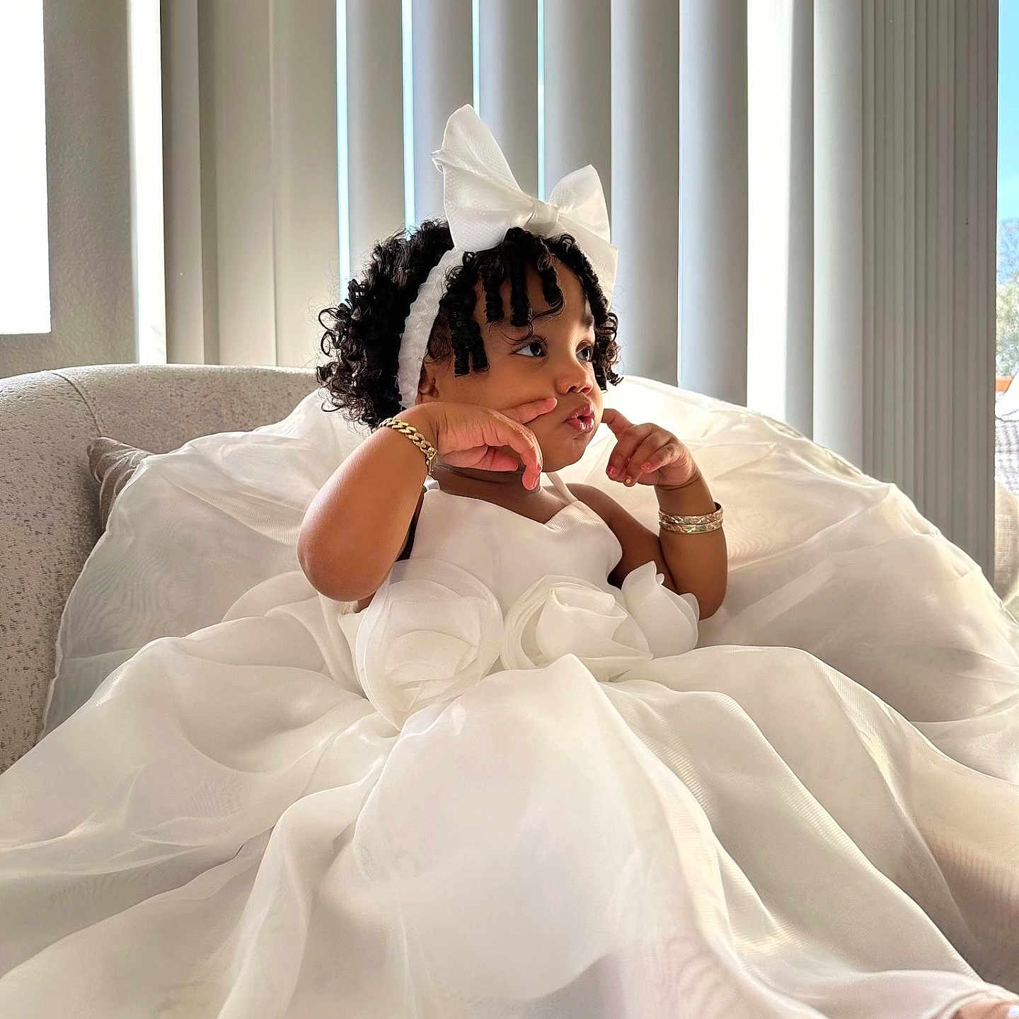 Yorelis joined the competition — help win amazing prizes! adult, blackhair, blanket, bride, clothing, curlyhair, dress, face, fashion, female, formalwear, gown, hair, head, person, sitting, sleeve, wedding, wig, woman