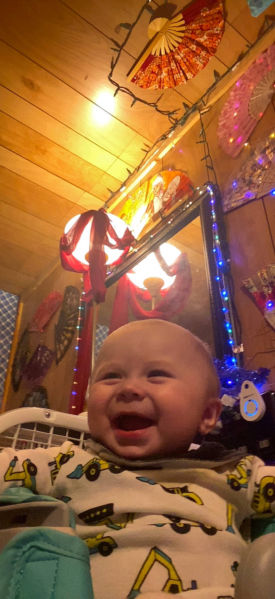 Braxton joined the competition — help win amazing prizes! baby, baby_toddler_clothing, cheek, chin, christmas_decoration, christmas_ornament, event, fun, happy, head, headwear, human_body, light, lighting, ornament, person, photograph, red, smile, snapshot