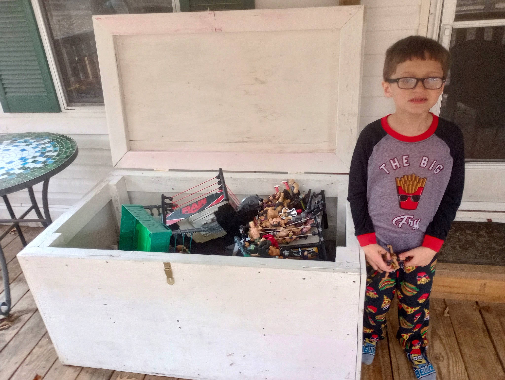 Aiden joined the competition — help win amazing prizes! box, chair, eyewear, gas, knee, outdoor_furniture, outdoor_table, person, personal_protective_equipment, recreation, room, sitting, sleeve, soil, t_shirt, table, toddler, toy, whiteboard, wood