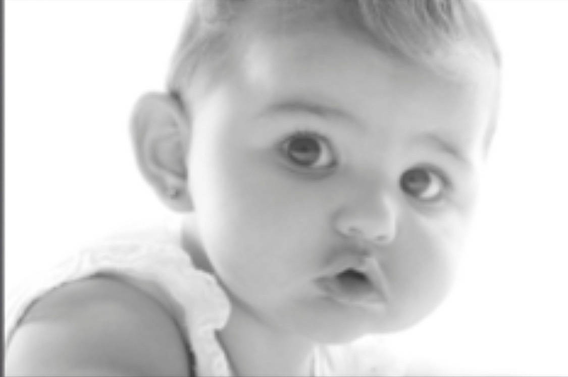 Maya participe au concours pour gagner de l'argent avec cette photo : baby, black_and_white, cheek, child, ear, eye, eyelash, flash_photography, fun, gesture, happy, iris, jaw, lip, monochrome, monochrome_photography, nose, person, portrait_photography, style