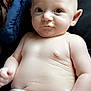 Alaric is registered to the contest to win money with this photo: arm, baby, bed, blanket, blue, child, comfort, cute, diaper, expression, eyes, face, hand, human, infant, lying_down, portrait, skin, torso, young
