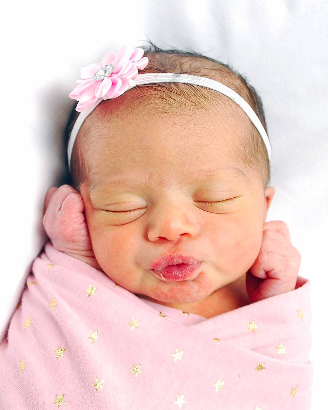 Jolie joined the competition — help win amazing prizes! baby, baby_sleeping, cheek, child, close_up, face, fashion_accessory, forehead, hair_accessory, head, headband, headgear, headpiece, lip, mouth, nose, person, photography, pink, skin