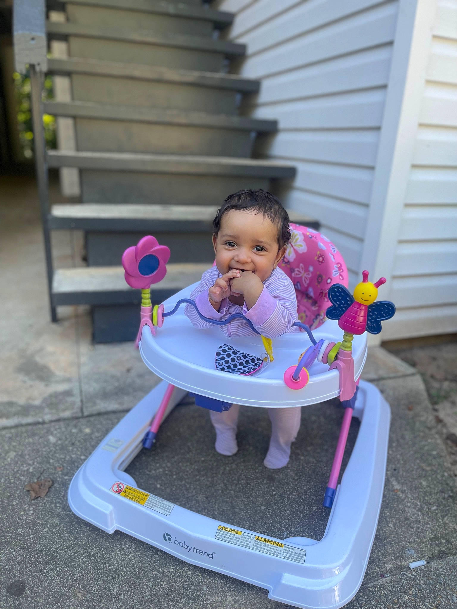 Mariah joined the competition — help win amazing prizes! baby, baby_products, baby_toddler_clothing, child, comfort, door, fun, grass, happy, joy, leisure, person, pink, play, recreation, riding_toy, sitting, smile, stairs, tire