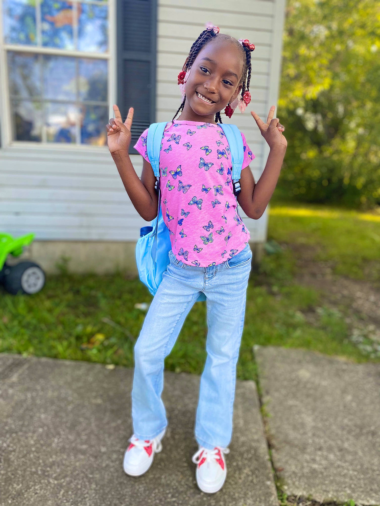 A'Aleigha joined the competition — help win amazing prizes! baby_toddler_clothing, child, denim, electric_blue, face, fun, grass, happy, joy, leg, leisure, magenta, pattern, person, pink, plant, recreation, sleeve, smile, t_shirt