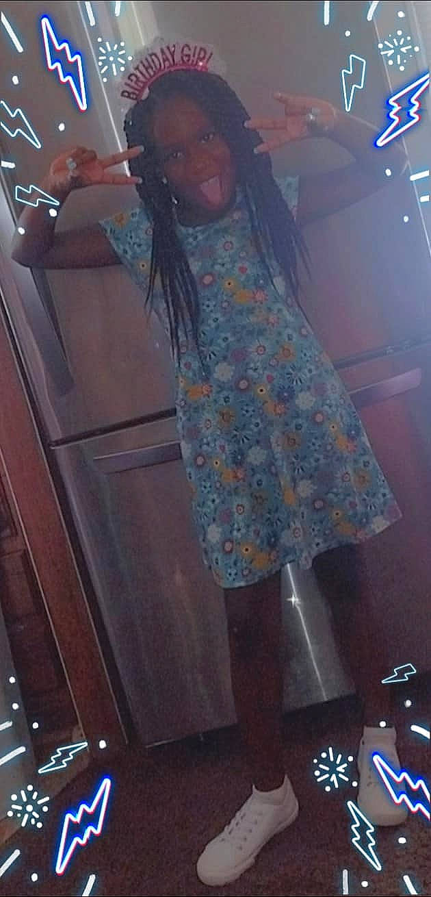 A'Nyiah joined the competition — help win amazing prizes! beard, costume, dress, entertainment, event, facial_hair, fashion_design, formal_wear, fun, human_leg, magenta, music, pattern, performance, performing_arts, person, purple, room, thigh, under_exposed