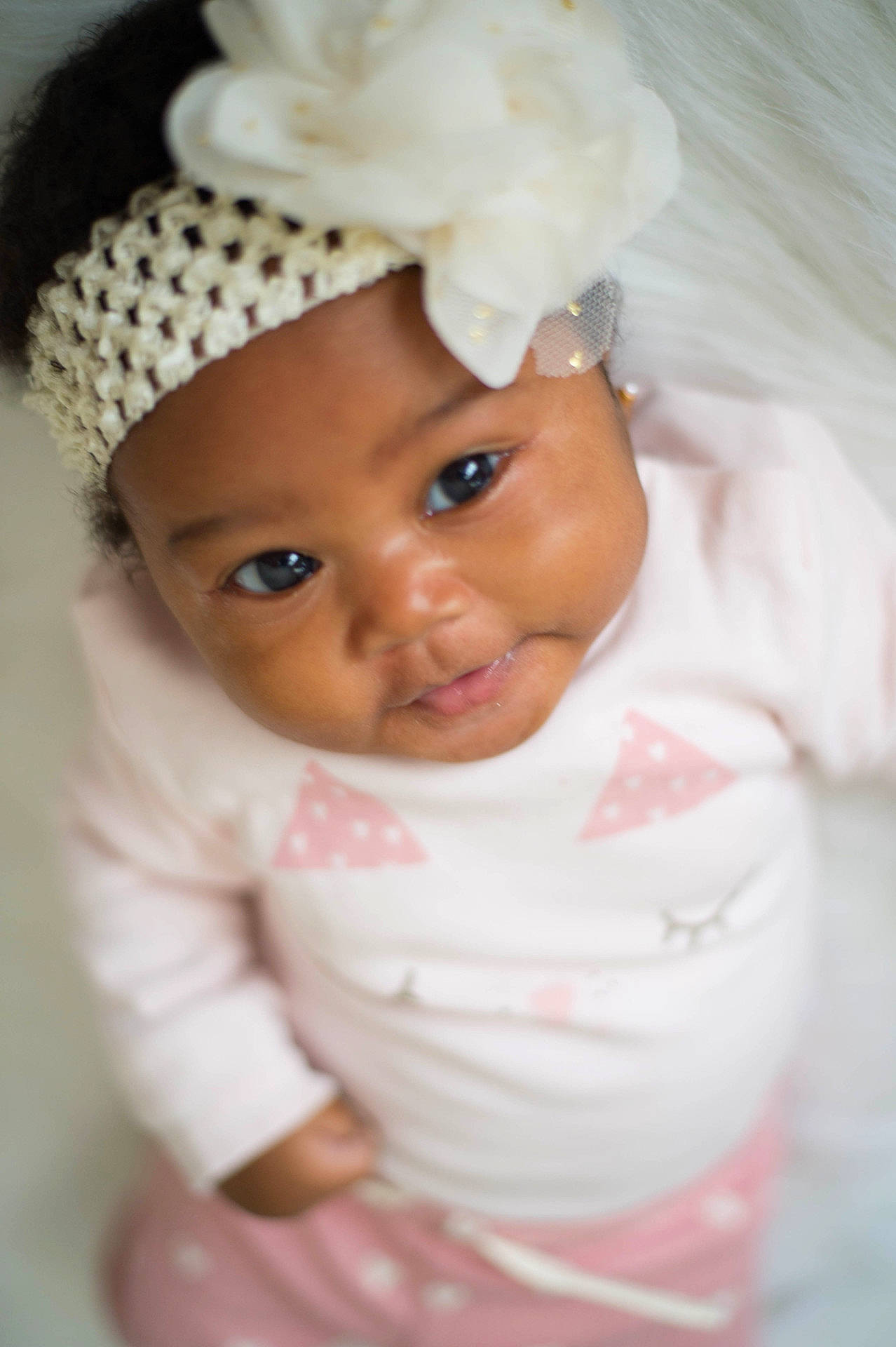 Brooklynn is registered to the contest to win money with this photo: cheek, child, girl, hair_accessory, headgear, headwear, infant, iris, lip, person, pink, product, skin, smile, toddler