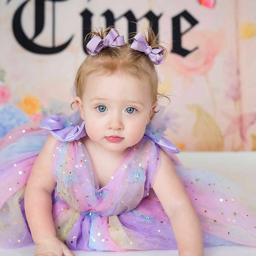 Marley Jo joined the competition — help win amazing prizes! accessories, baby, babycrawling, clothing, costume, crawling, dahlia, dress, face, fashion, flower, formalwear, hair, head, jewelry, person, photography, portrait, sitting, sleeve