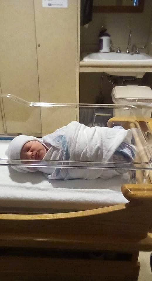 Theresa is registered to the contest to win money with this photo: baby_products, bed, bed_frame, bed_sheet, bedding, bedroom, cabinetry, comfort, flooring, glass, hardwood, headwear, linens, mattress, nap, person, room, serveware, sitting, sleep