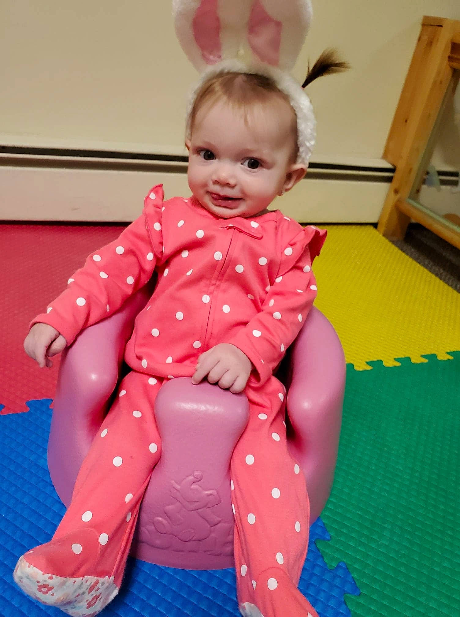 Lorelai is registered to the contest to win money with this photo: baby, baby_toddler_clothing, child, design, leg, pajamas, pattern, person, pink, play, polka_dot, sitting, skin, sleeve, tights, toddler