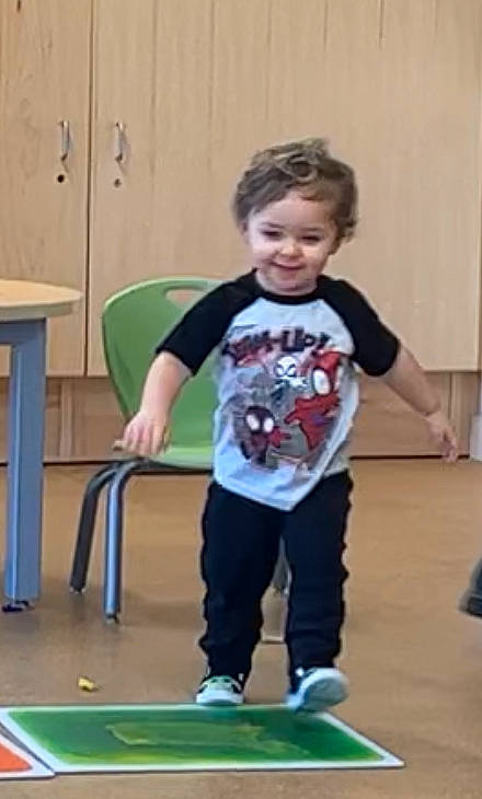 Richard joined the competition — help win amazing prizes! balance, child, flooring, fun, hardwood, joy, knee, leisure, mammal, person, play, recreation, room, sitting, sleeve, smile, sports, sports_equipment, t_shirt, toddler