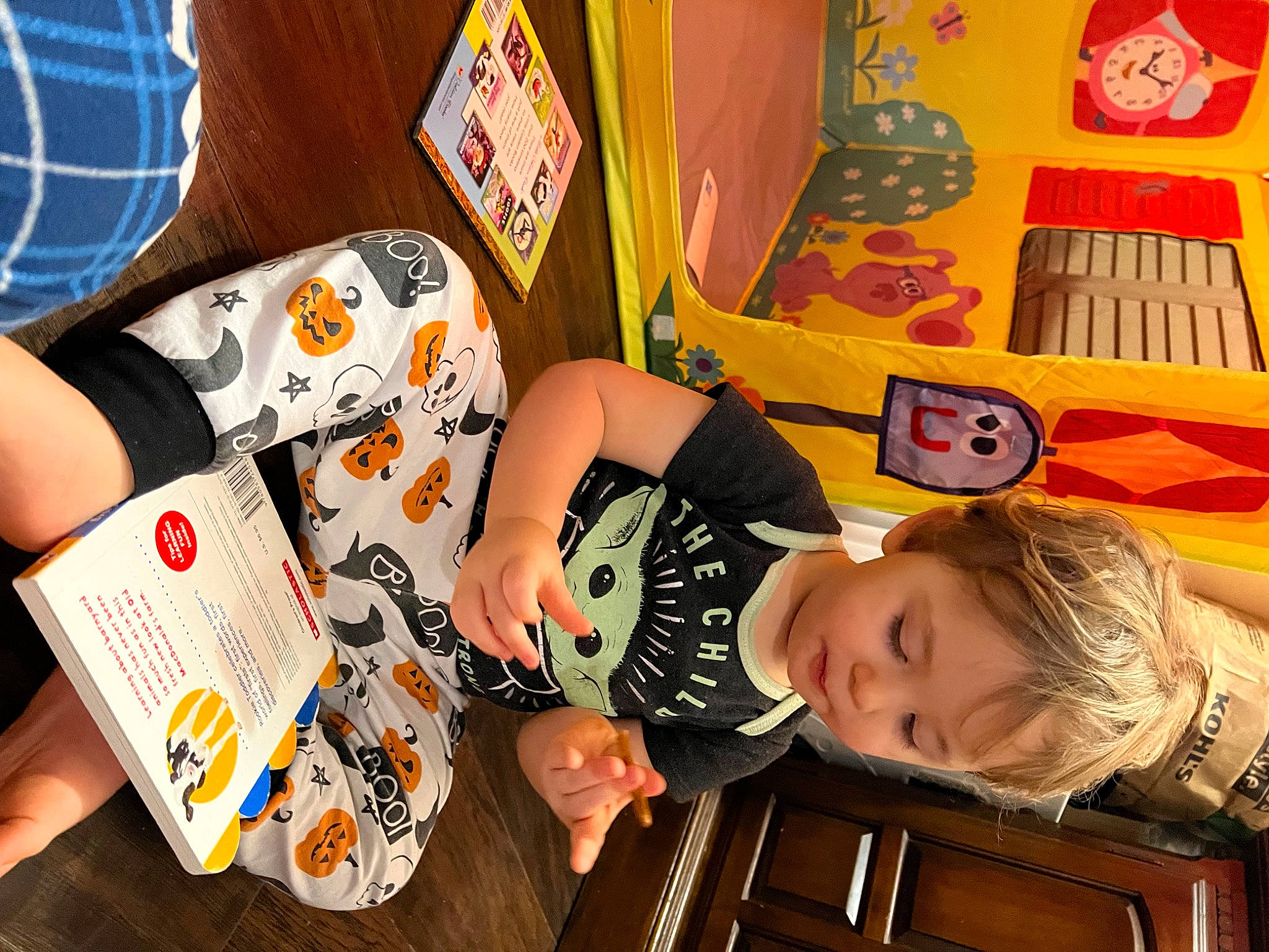 Richard is registered to the contest to win money with this photo: art, child, fun, games, happy, illustration, kindergarten, nail, orange, pattern, person, plaid, play, recreation, room, t_shirt, tartan, toddler, visual_arts, wrist