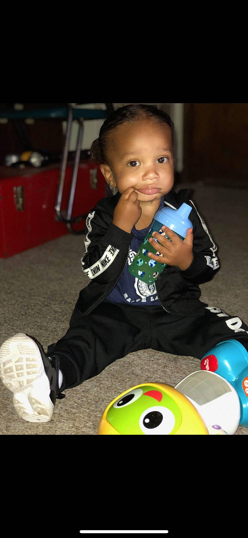 Marcellus is registered to the contest to win money with this photo: baby, ball, child, football, footwear, person, play, soccer_ball, toddler