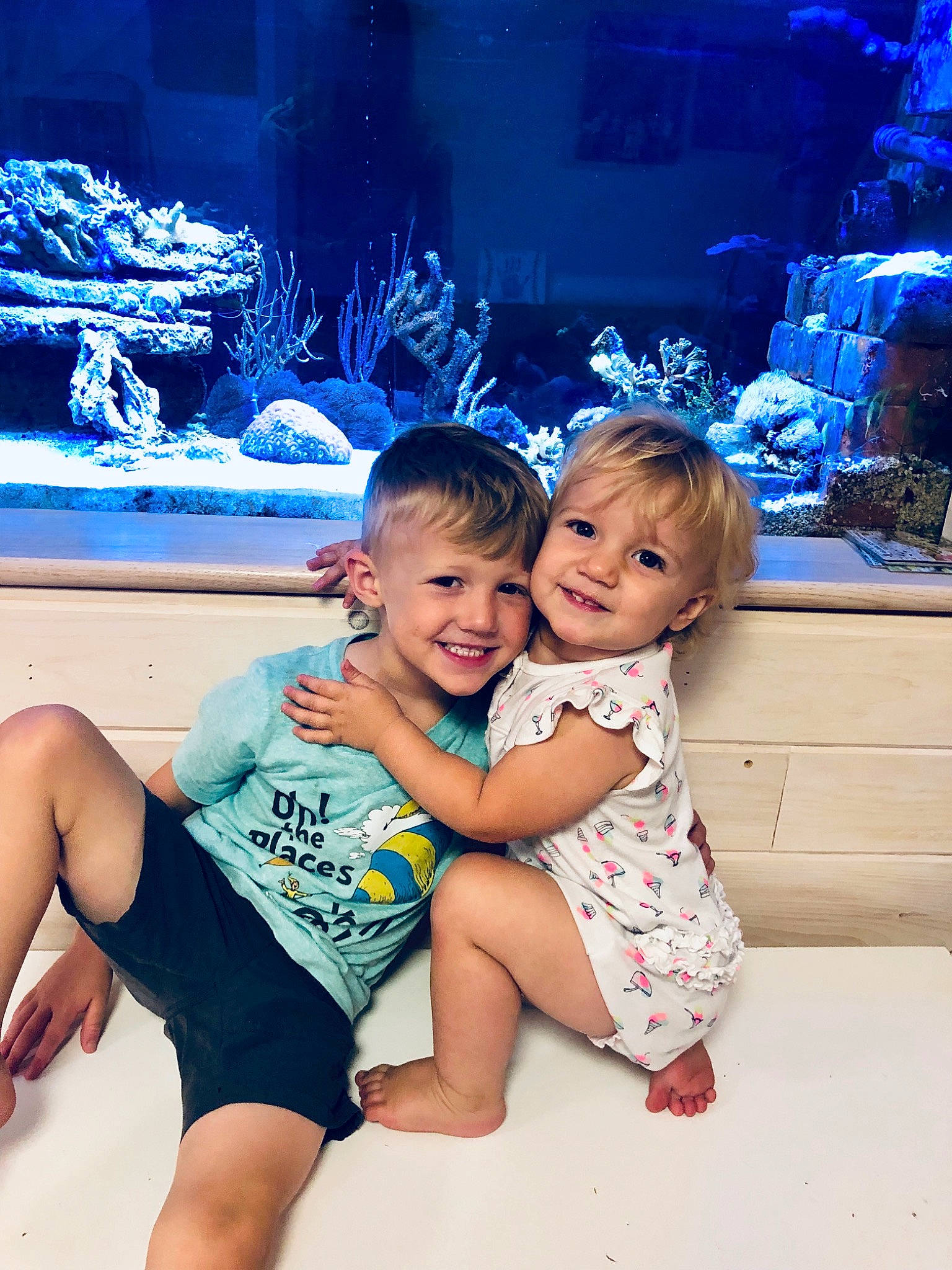 Aniston joined the competition — help win amazing prizes! baby, blue, child, daughter, family, fun, happy, joy, leisure, people, person, photography, play, skin, smile, snapshot, summer, toddler, tourism, vacation