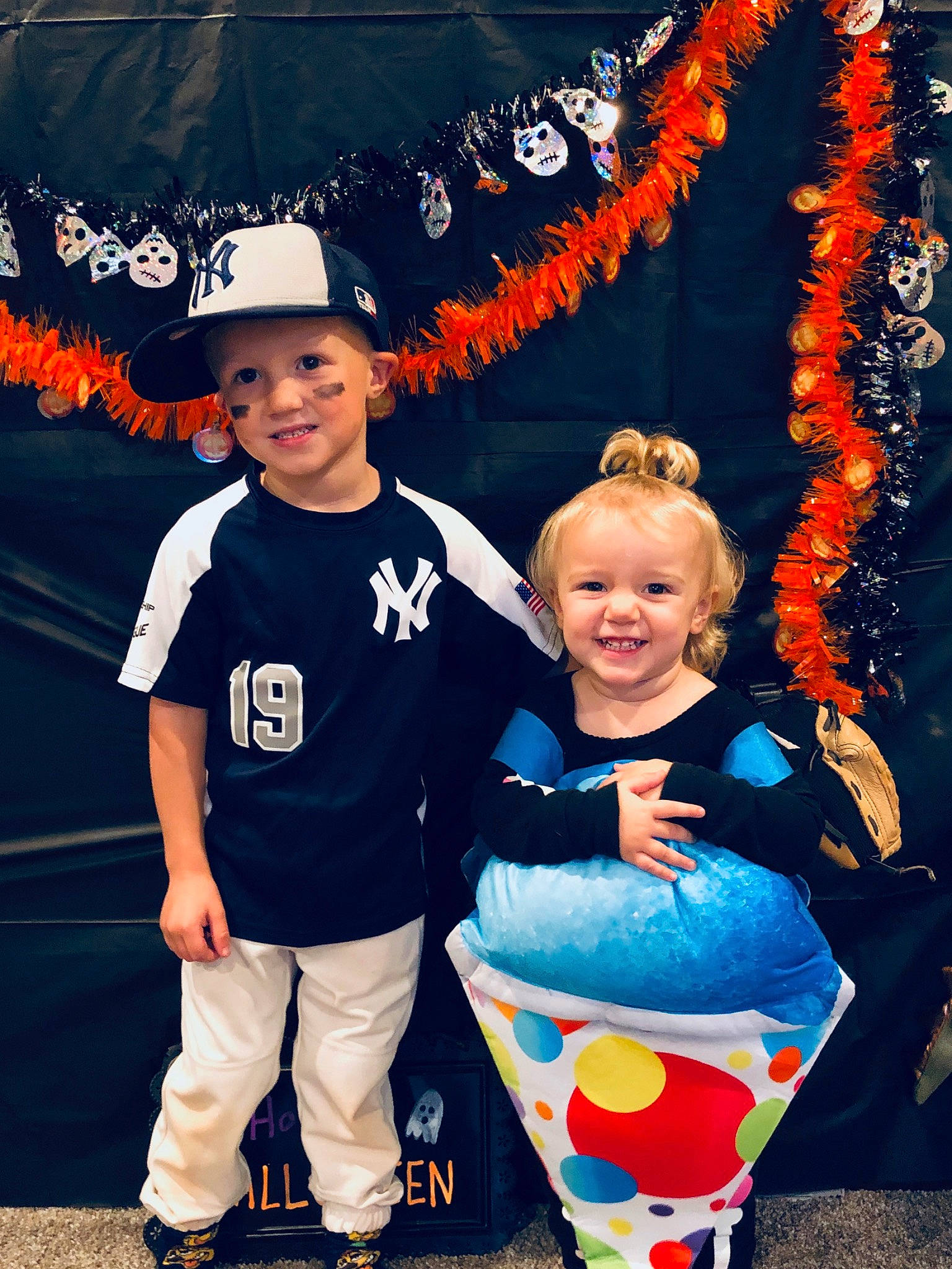 Aniston joined the competition — help win amazing prizes! blue, child, cool, costume, daughter, event, family, fun, happy, headwear, joy, leisure, people, person, photography, sibling, smile, t_shirt, toddler, trick_or_treat