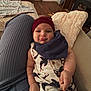 Elias joined the competition — help win amazing prizes! baby, infant, child, hat, clothing, pillow, knit, pattern, whale, person, legs, couch, floor, wood, home, indoors, smile, face, comfort, relaxation