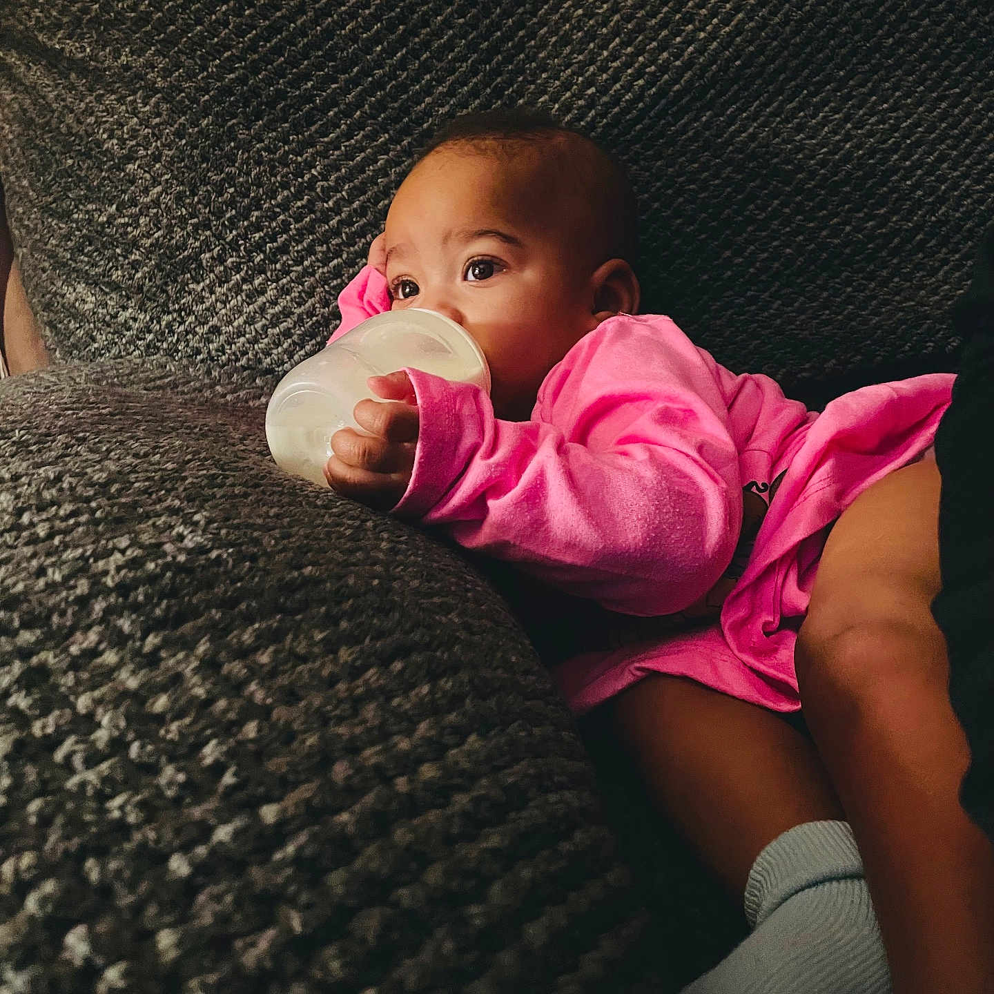 Samari joined the competition — help win amazing prizes! baby, bottle, casual, child, comfort, couch, eyes, face, hand, indoor, infant, milk, person, pink_clothing, relaxing, resting, socks, soft, texture, young