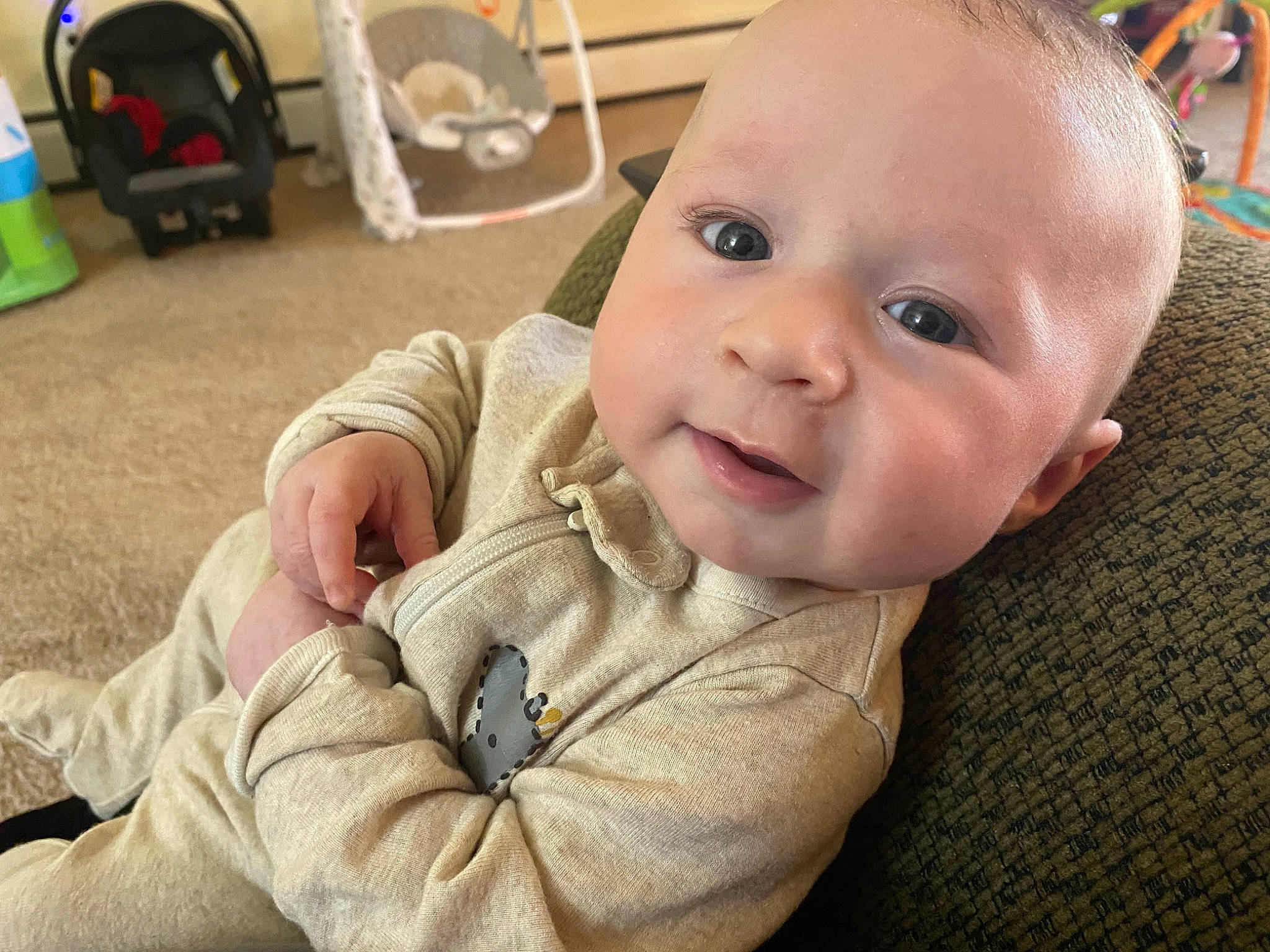 Casey joined the competition — help win amazing prizes! baby, baby_toddler_clothing, cheek, chin, comfort, eye, eyebrow, eyelash, flooring, happy, head, iris, nose, person, sitting, skin, sleeve, smile, thumb, toddler