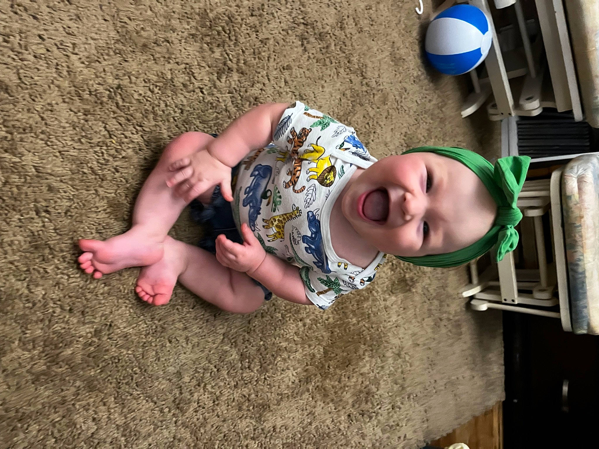 Emerie joined the competition — help win amazing prizes! barefoot, child, foot, fun, grass, happy, hat, human_leg, leisure, person, play, recreation, sitting, soil, t_shirt, thigh, toddler, tree, vacation, water