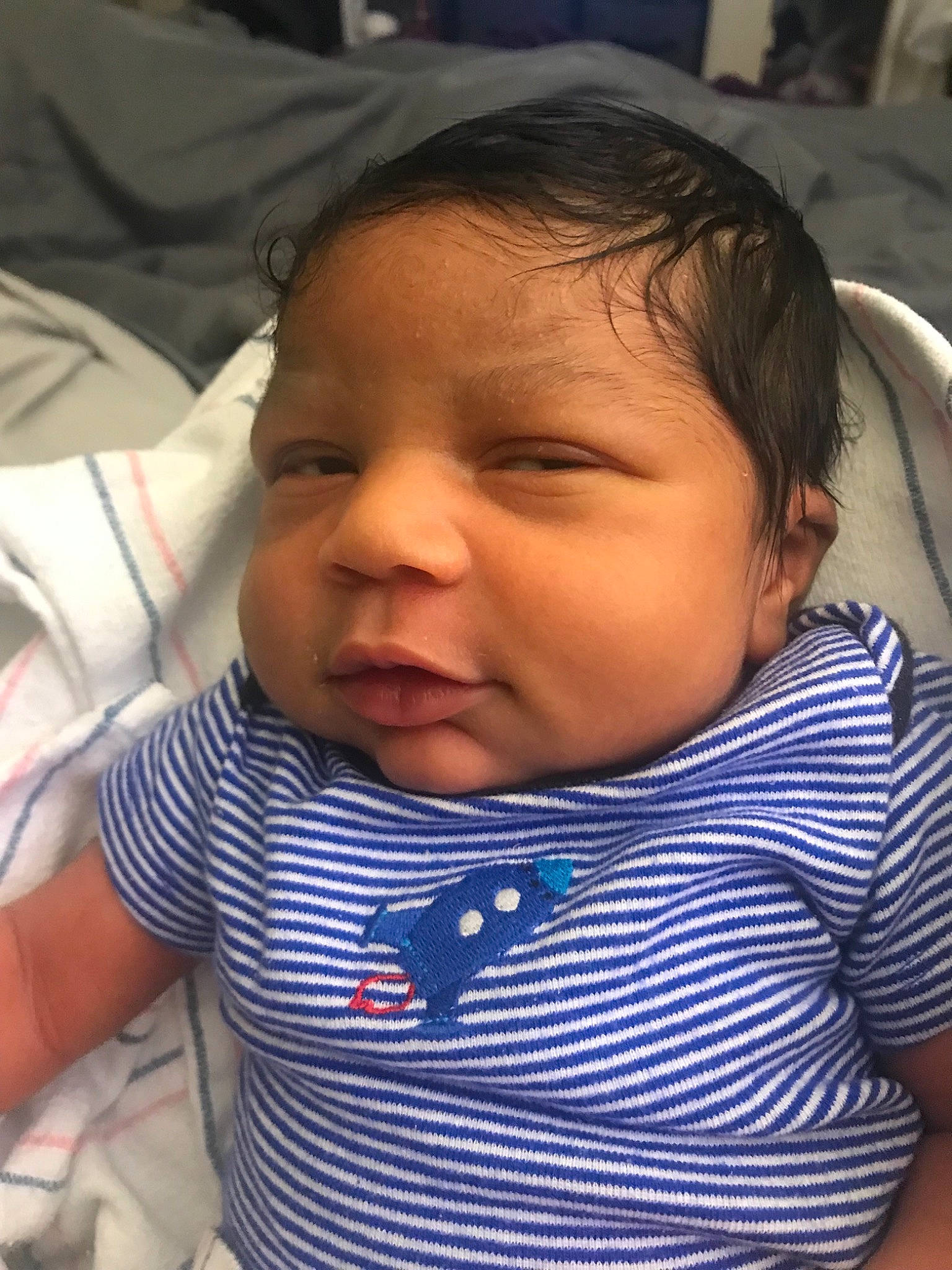 Jonas is registered to the contest to win money with this photo: baby, cheek, child, chin, ear, eye, face, facial_expression, forehead, head, lip, mouth, nose, person, skin, sleep, smile, toddler