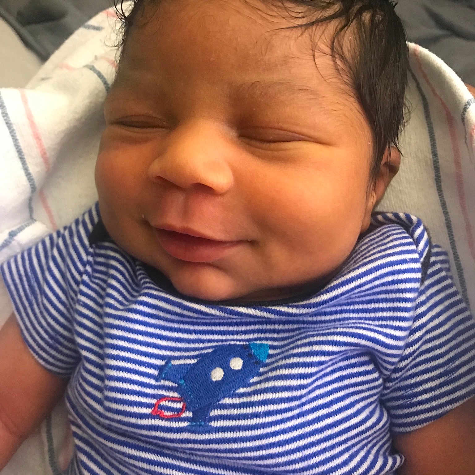 Jonas is registered to the contest to win money with this photo: baby, cheek, child, chin, ear, face, forehead, head, lip, mouth, neck, nose, person, skin, sleep, smile, toddler
