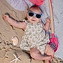baby, sunglasses, beach, sand, seashell, starfish, shovel, sandcastle, dress, child, toy, summer, relaxation, sunny, outdoor, cute, play, vacation, infant, fun