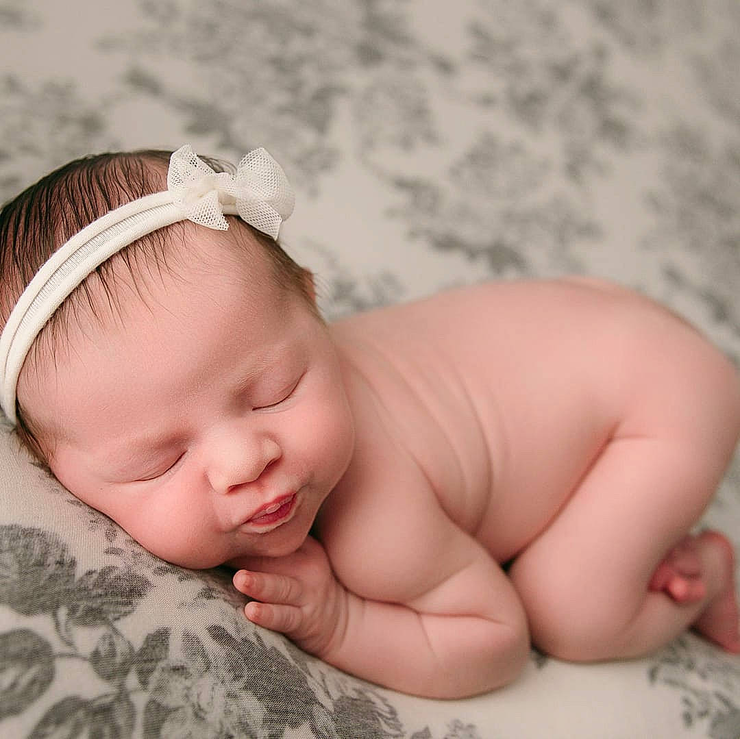 Addalyn is registered to the contest to win money with this photo: baby, baby_sleeping, cheek, child, fashion_accessory, finger, hair_accessory, hand, headband, headgear, mouth, muscle, person, photograph, photography, pink, portrait_photography, skin, sleep, toddler