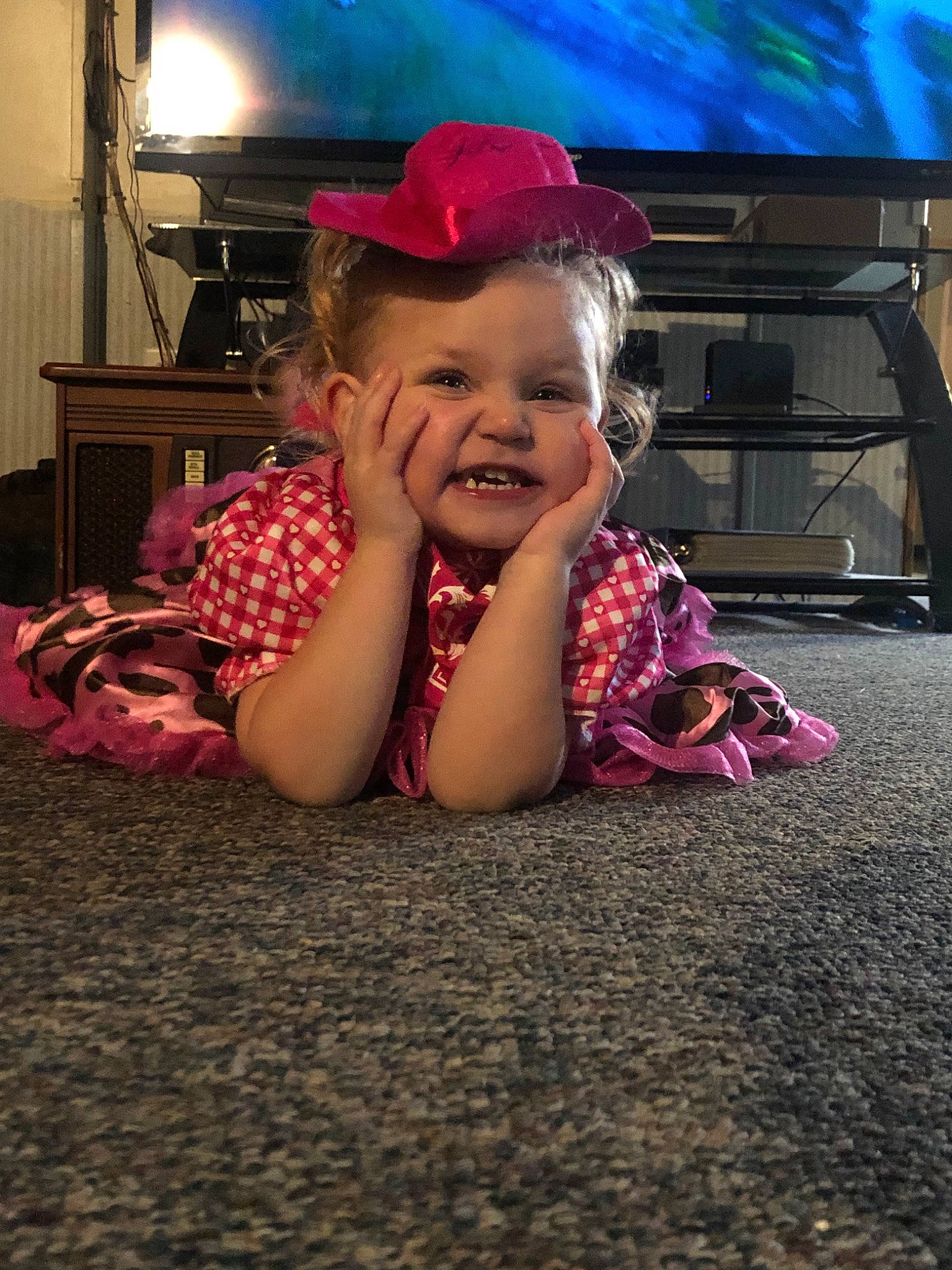 Reagan joined the competition — help win amazing prizes! cheek, child, facial_expression, fashion_accessory, fun, happy, head, headgear, human_body, laugh, person, photography, pink, play, sitting, skin, smile, snapshot, technology, toddler