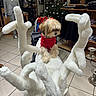 animal, christmas_tree, clothing, curious, cute, decoration, dog, fabric, furry, holiday, indoor, mannequin, pet, portrait, red_sweater, shelf, shopping, store, tile_floor, white_sculpture