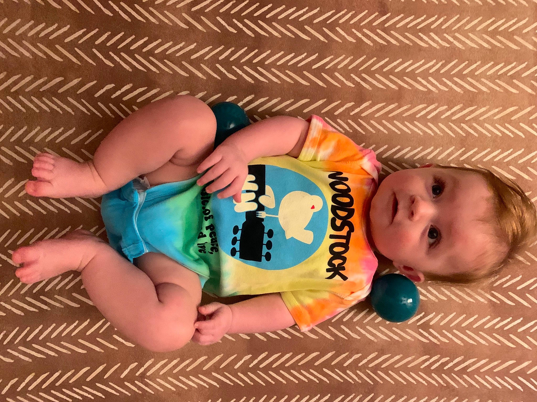 Corbin joined the competition — help win amazing prizes! baby, baby_products, baby_toddler_clothing, cheek, child, comfort, finger, foot, happy, leg, nail, orange, pattern, person, pink, skin, smile, textile, thigh, toddler