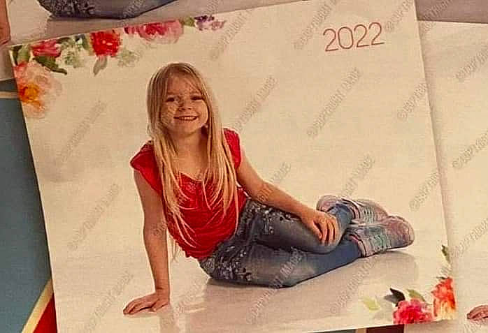 Charity joined the competition — help win amazing prizes! art, dress, fashion_design, flooring, happy, human_leg, joy, knee, magenta, paper, paper_product, pattern, peach, person, pink, room, sitting, smile, textile, thigh