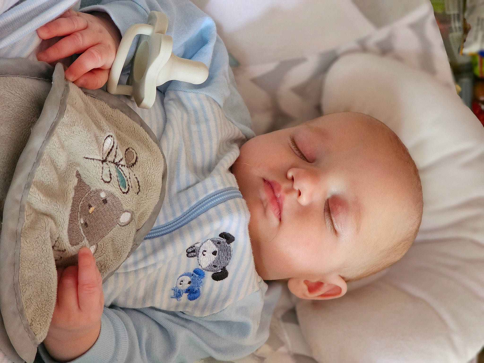Hunter is registered to the contest to win money with this photo: baby, baby_products, baby_sleeping, baby_toddler_clothing, bedtime, cheek, child, comfort, ear, head, linens, mammal, mouth, nap, person, room, skin, sleep, sleeve, toddler